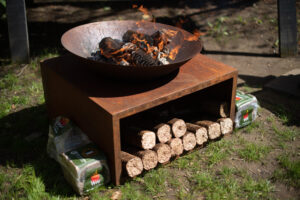 WillowWarm carbon-neutral briquettes being used in an outdoor fire pit WillowWarm carbon-neutral briquettes burn perfect in outdoor stoves and fire pits all year round