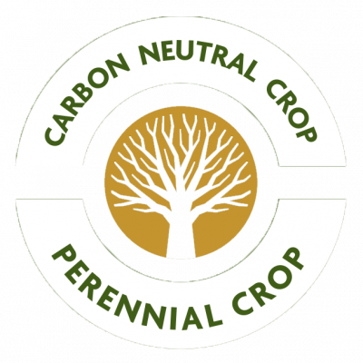 Circle image with a tree in the centre and the words around the edges stating Carbon neutral crop, Preennial crop circular badge