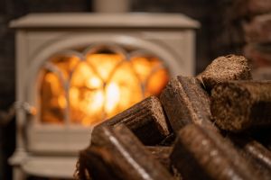 WillowWarm Briquette bales sitting in front of an open fire
